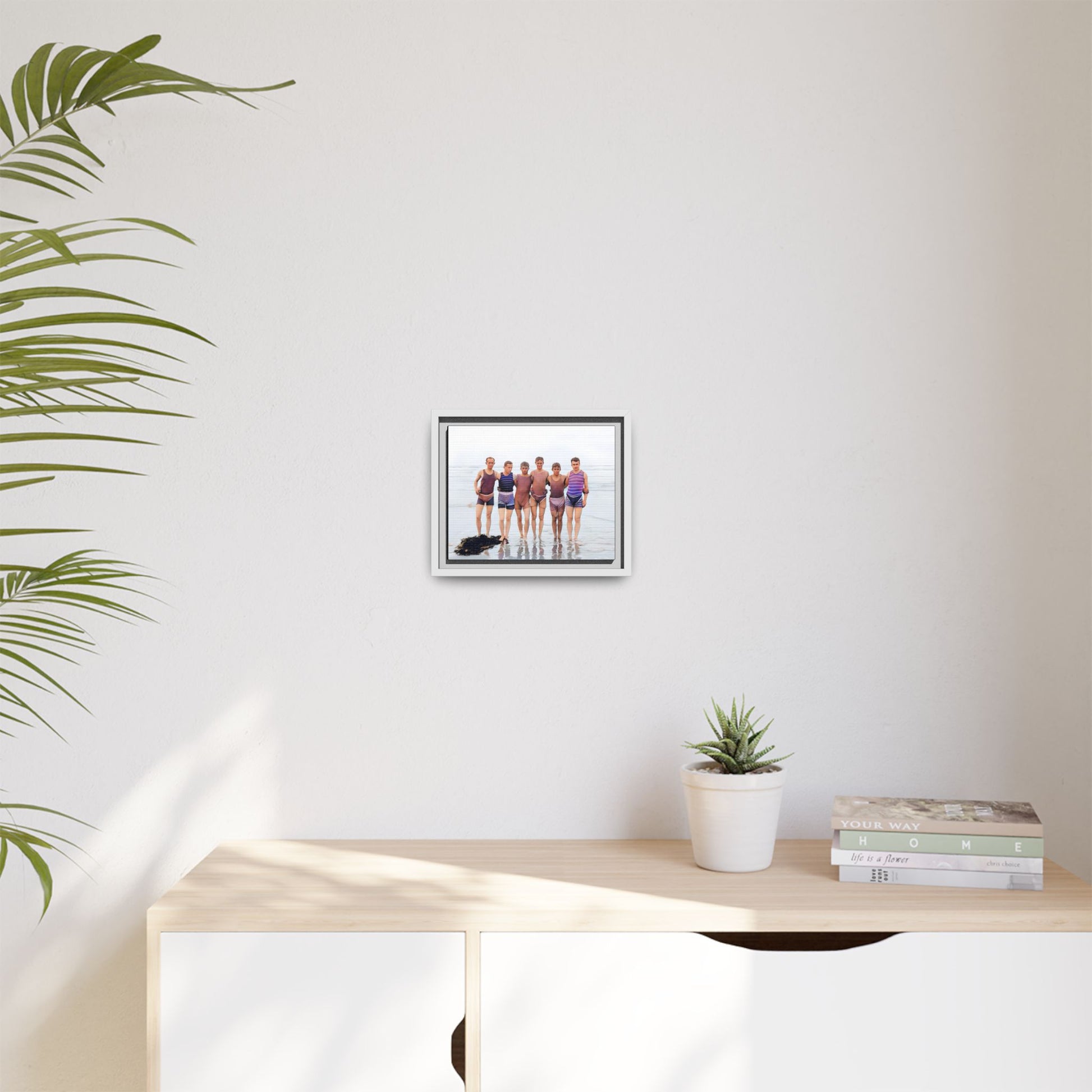 A framed vintage beach portrait on matte canvas featuring a joyful group at Herring Cove Beach, Provincetown, capturing timeless summer camaraderie.