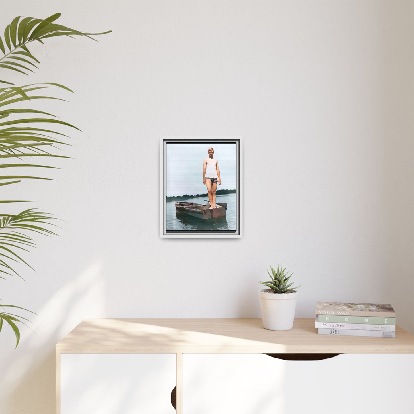 A framed vintage lake portrait on matte canvas featuring George standing on a rowboat at Creve Coeur Lake, Missouri, capturing timeless outdoor nostalgia.