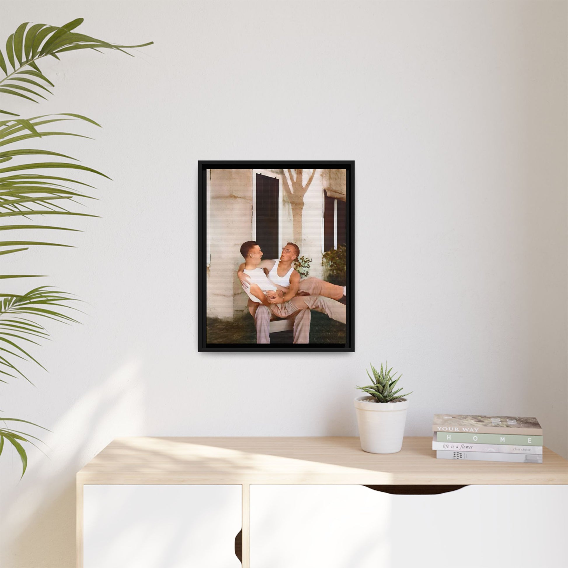 A vintage photograph of Donald and Joseph, two men embracing with joy in 1930s New Orleans. Captured in warm sunlight against a rustic Louisiana home, this intimate portrait celebrates LGBTQ+ history, love, and the beauty of unspoken connection. Gay Couple