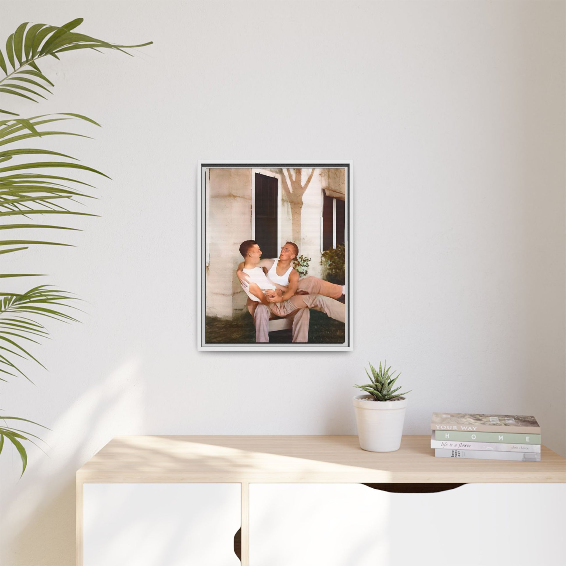 A vintage photograph of Donald and Joseph, two men embracing with joy in 1930s New Orleans. Captured in warm sunlight against a rustic Louisiana home, this intimate portrait celebrates LGBTQ+ history, love, and the beauty of unspoken connection. Gay Couple