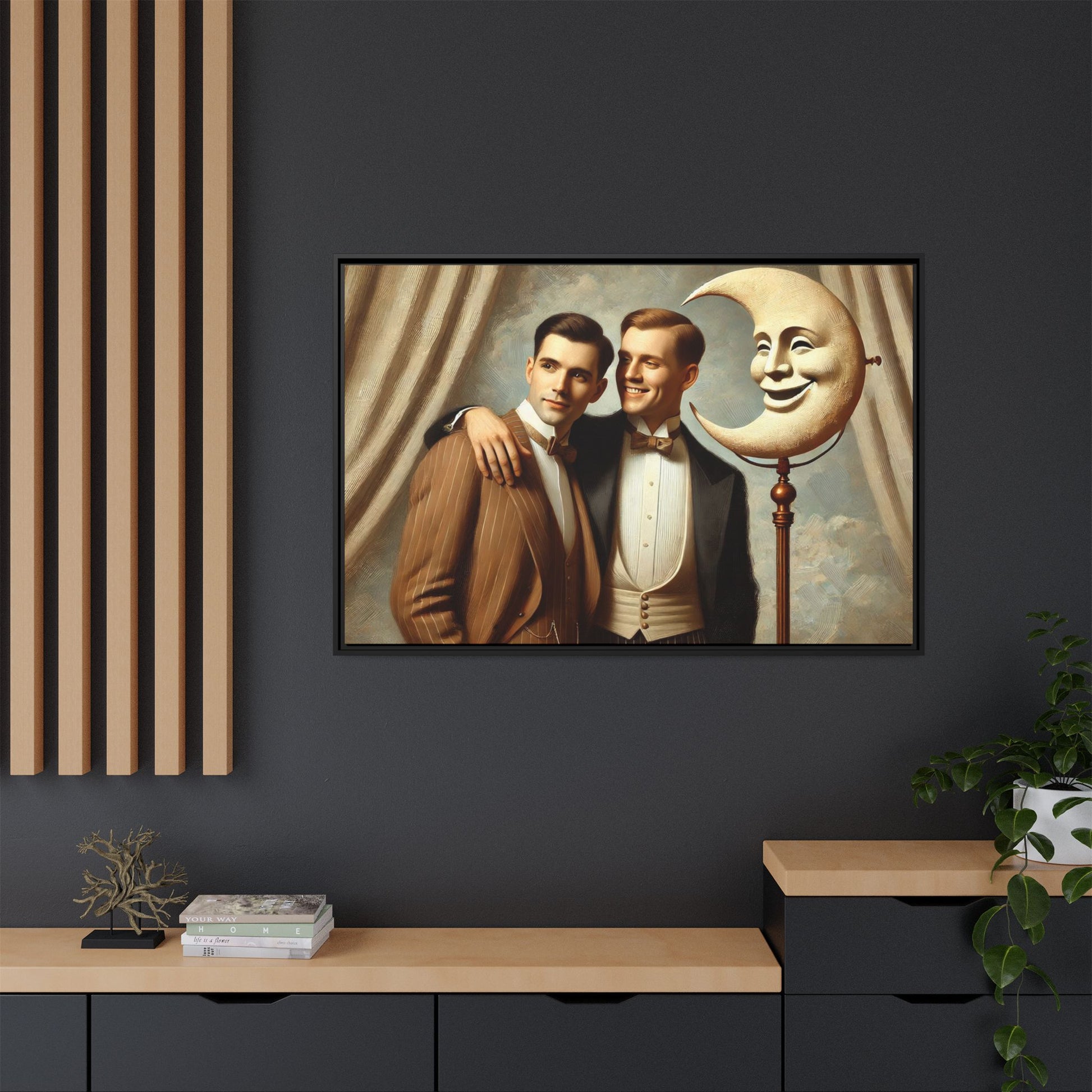 Framed matte canvas artwork of two men in vintage tuxedos standing beside a crescent moon prop. This piece reclaims LGBTQ+ representation lost to bias and honors everyday moments of affection and connection once absent from historical archives.