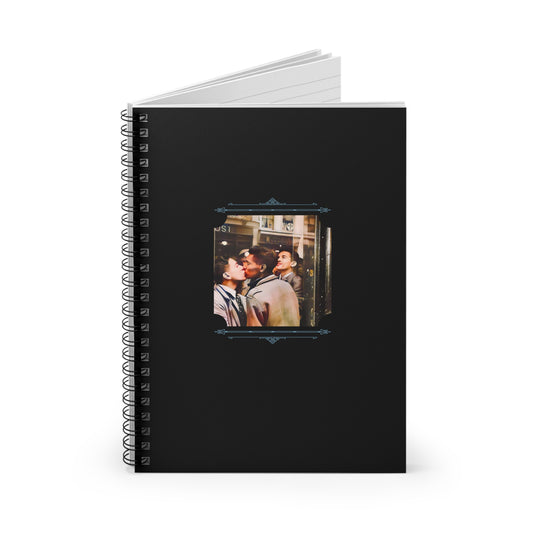 Restored vintage photo of African-American gay couple sharing a kiss in public, printed on a black spiral notebook