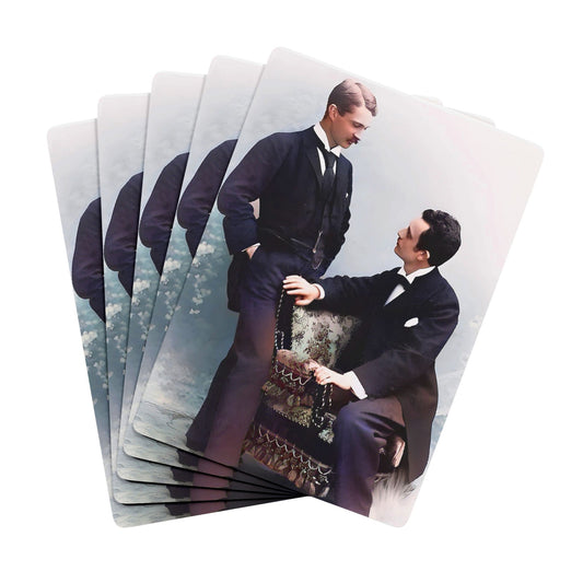 A restored vintage photo of a gay couple in formal attire, sharing a quiet moment of love and connection in a classic studio setting.