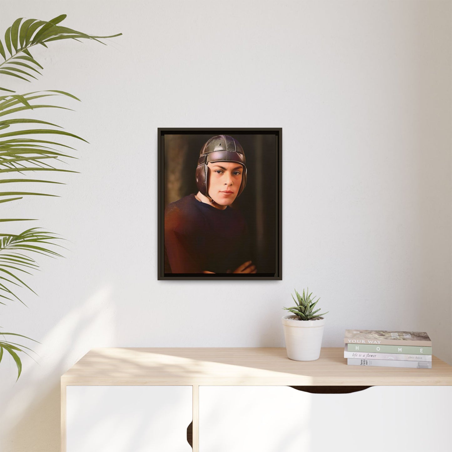 A vintage portrait of Andrew, a football player from Lincoln, Nebraska, in a classic leather helmet. This framed matte canvas print captures the grit and determination of early 20th-century sports, perfect for football fans and vintage art collectors.