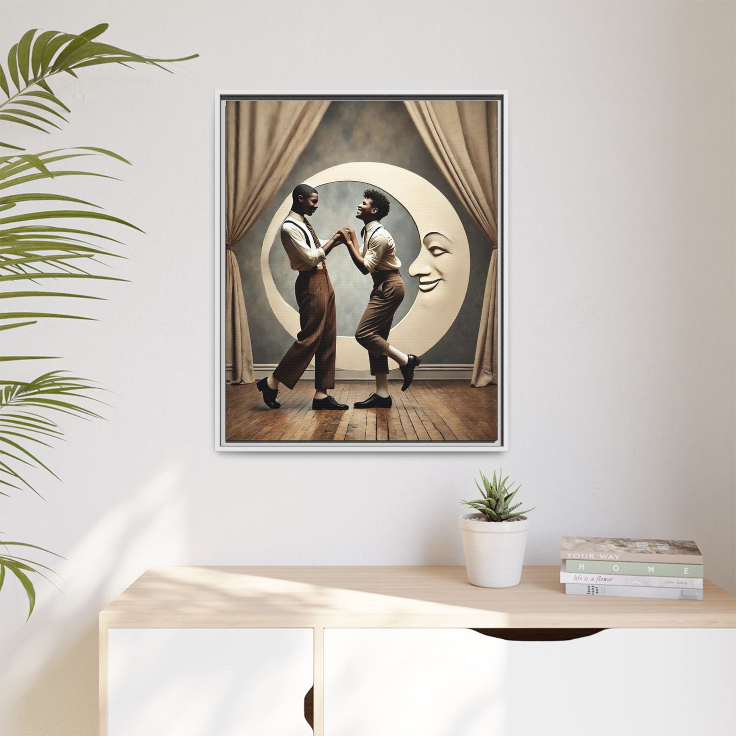 Two joyful young Black men dressed in 1920s fashion dancing in front of a crescent moon prop with a smiling face. This artwork reclaims erased queer love, offering a whimsical and powerful celebration of Black LGBTQ+ youth and history.