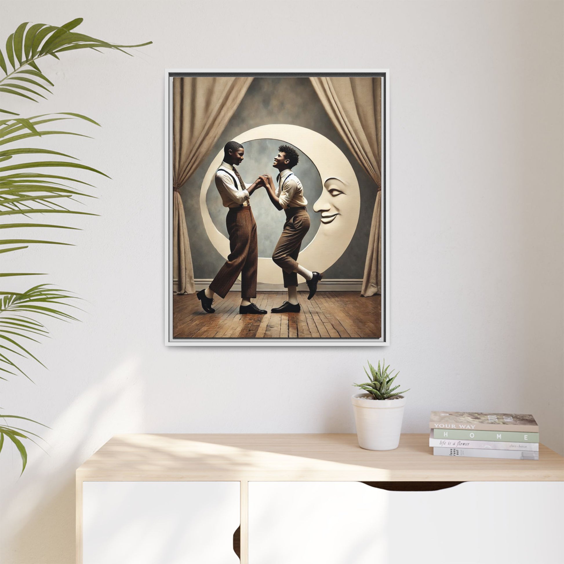 Two joyful young Black men dressed in 1920s fashion dancing in front of a crescent moon prop with a smiling face. This artwork reclaims erased queer love, offering a whimsical and powerful celebration of Black LGBTQ+ youth and history.