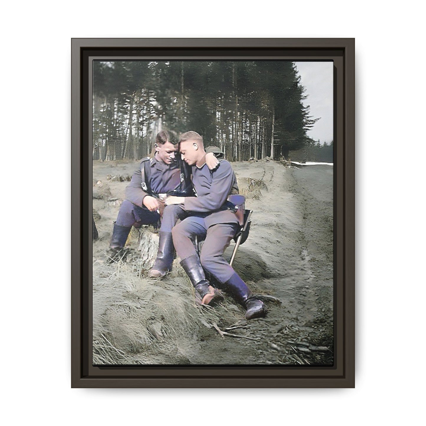 A beautifully restored WWI-era photograph featuring Felix and Engel, two soldiers seated closely on a tree stump in Verdun, France. Dressed in military uniforms with rugged boots, their affectionate expressions and serene forest backdrop capture a rare and intimate moment of connection and resilience during wartime. Vintage Foto Schwules Paar
