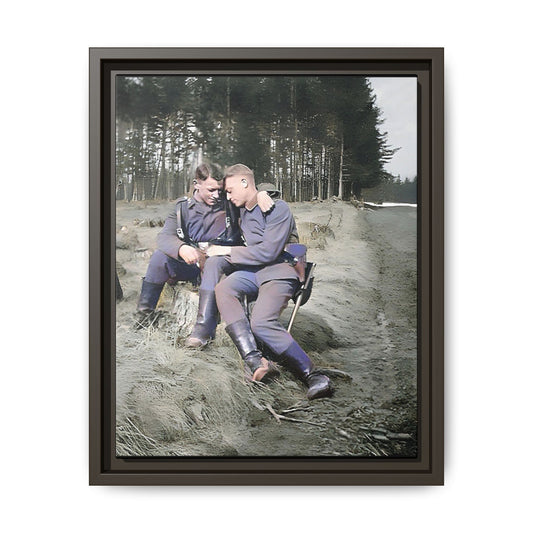 A beautifully restored WWI-era photograph featuring Felix and Engel, two soldiers seated closely on a tree stump in Verdun, France. Dressed in military uniforms with rugged boots, their affectionate expressions and serene forest backdrop capture a rare and intimate moment of connection and resilience during wartime. Vintage Foto Schwules Paar