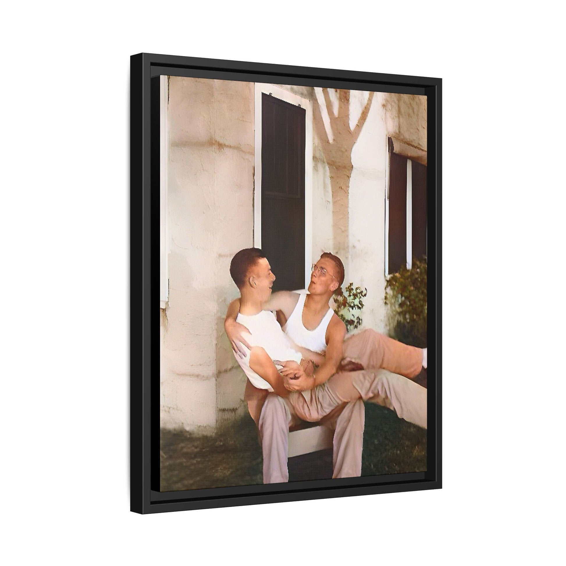 A vintage photograph of Donald and Joseph, two men embracing with joy in 1930s New Orleans. Captured in warm sunlight against a rustic Louisiana home, this intimate portrait celebrates LGBTQ+ history, love, and the beauty of unspoken connection. Gay Couple