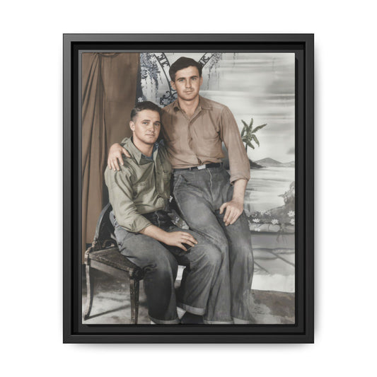 Vintage double portrait of two men posed closely with one seated in a chair before a scenic studio backdrop
