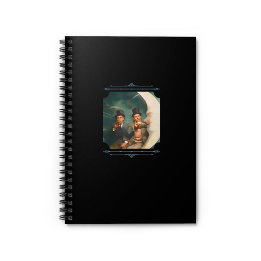 Spiral notebook featuring a vintage photo of two men in top hats posing together on a crescent moon at a carnival.