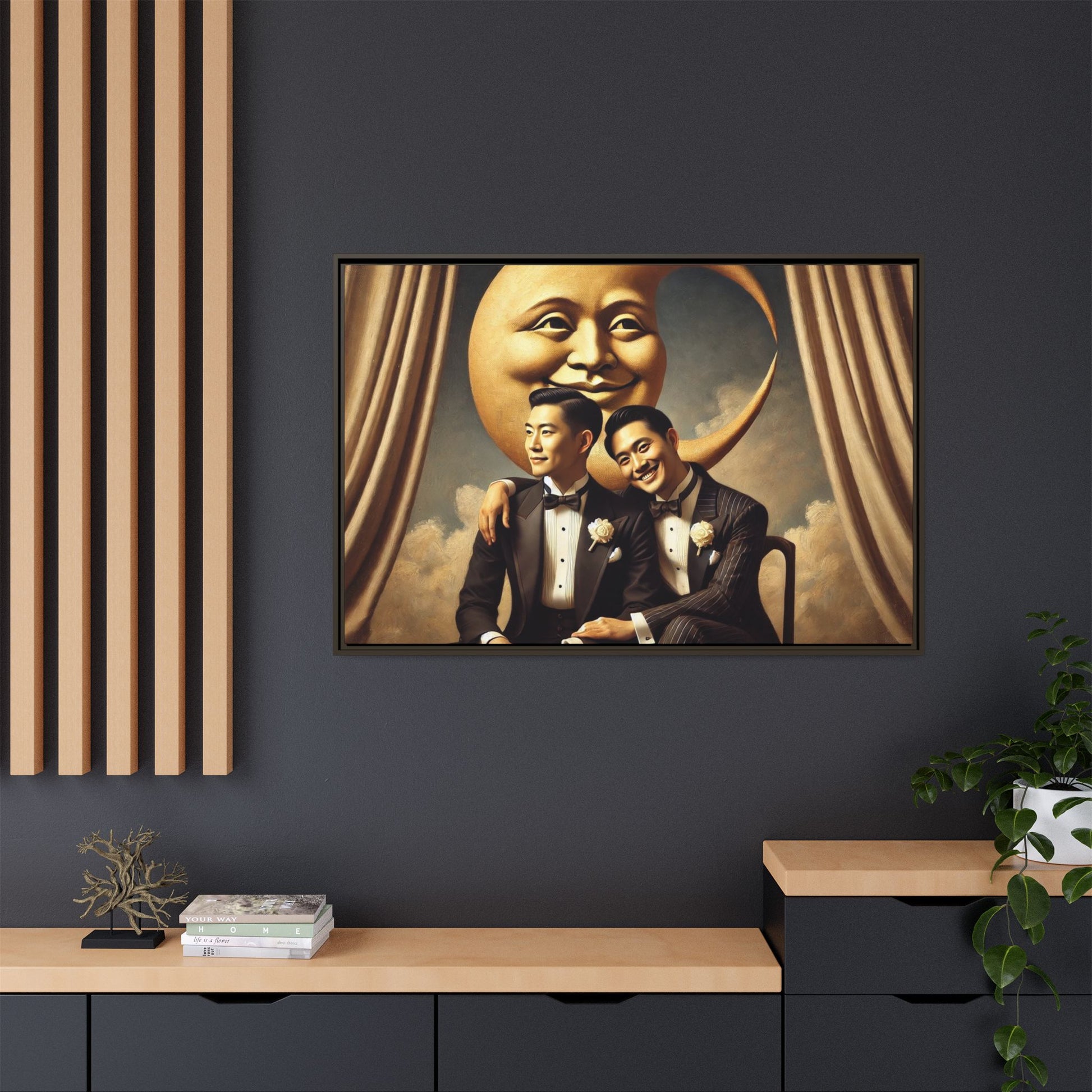 Vintage-inspired artwork of a romantic gay Asian couple in tuxedos sitting affectionately beneath a smiling crescent moon prop, surrounded by vintage stage curtains and dreamy clouds. A reclaimed queer narrative from the Man In The Moon series.