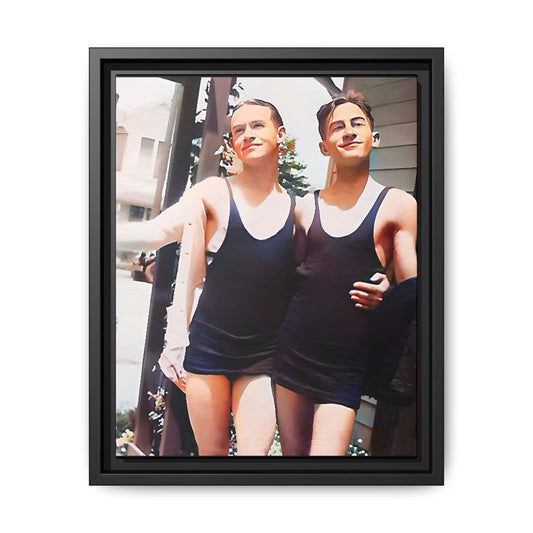 A beautifully restored vintage beach photo of two friends, Lee and Clifford, in classic black swimsuits, walking along Ocean Grove, New Jersey. Their smiles and relaxed body language capture the carefree joy of 1920s summer days, set against a charming coastal backdrop. Gay Couple
