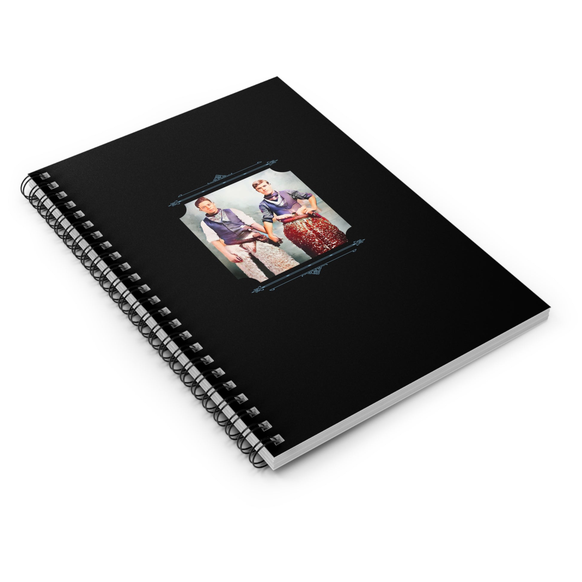 Restored early 1900s photo of two men in cowboy attire holding hands on a black spiral notebook