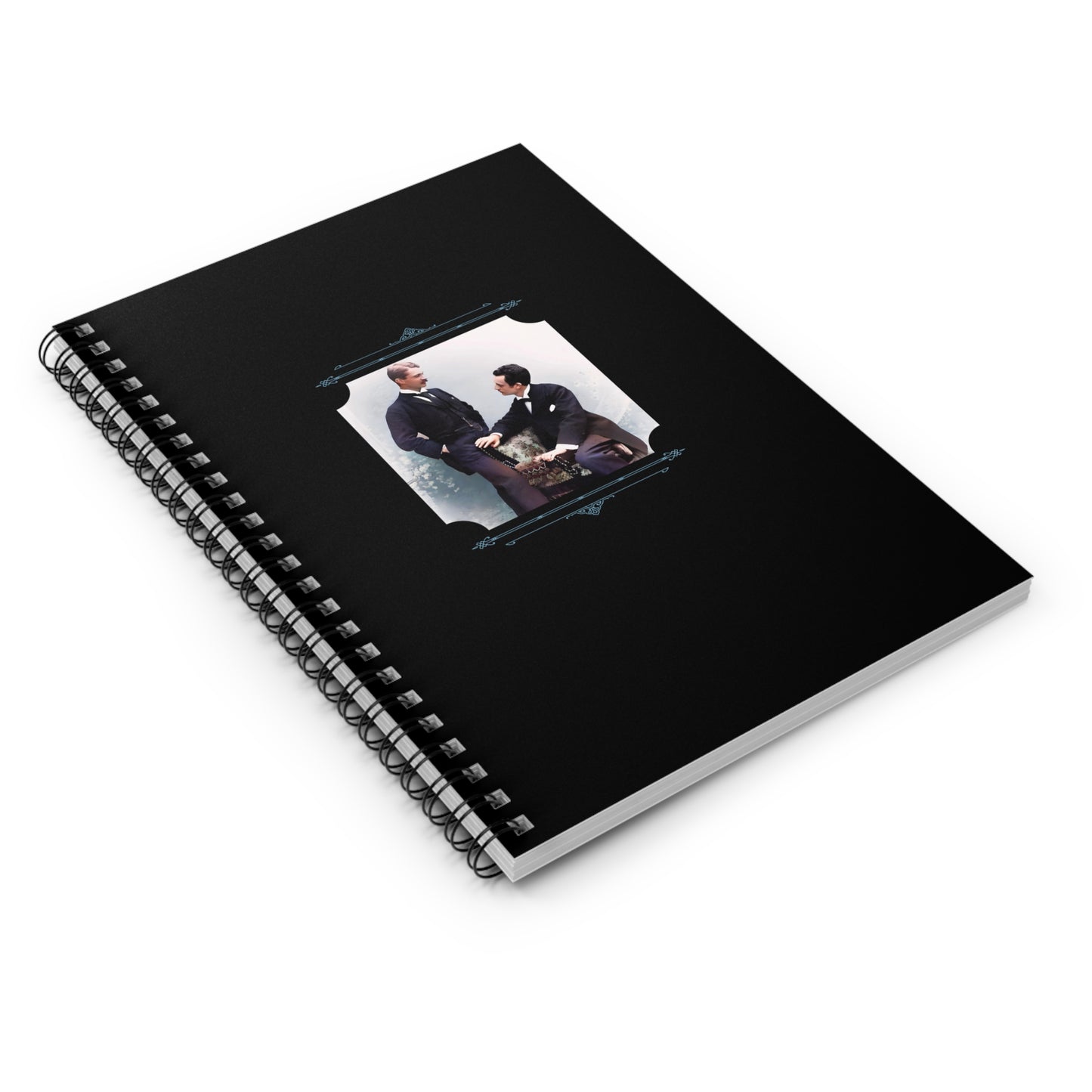 Colorized vintage photo of a Victorian gay couple in formalwear, featured on a black notebook with elegant blue framing