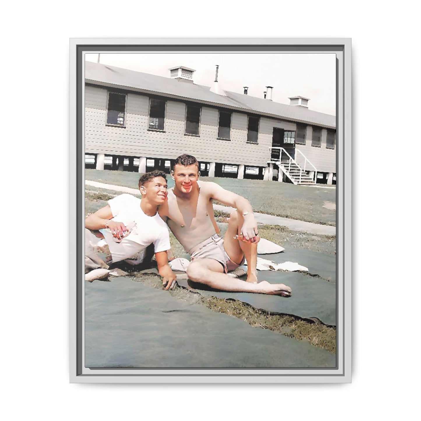 A framed vintage military portrait on matte canvas featuring Wayne and Jerry at Camp Blanding, Florida, capturing a timeless LGBTQ+ connection and companionship.
Gay Couple