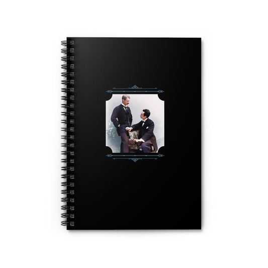 Black spiral notebook featuring a restored Victorian-era photo of two men in formal suits sharing an intimate moment