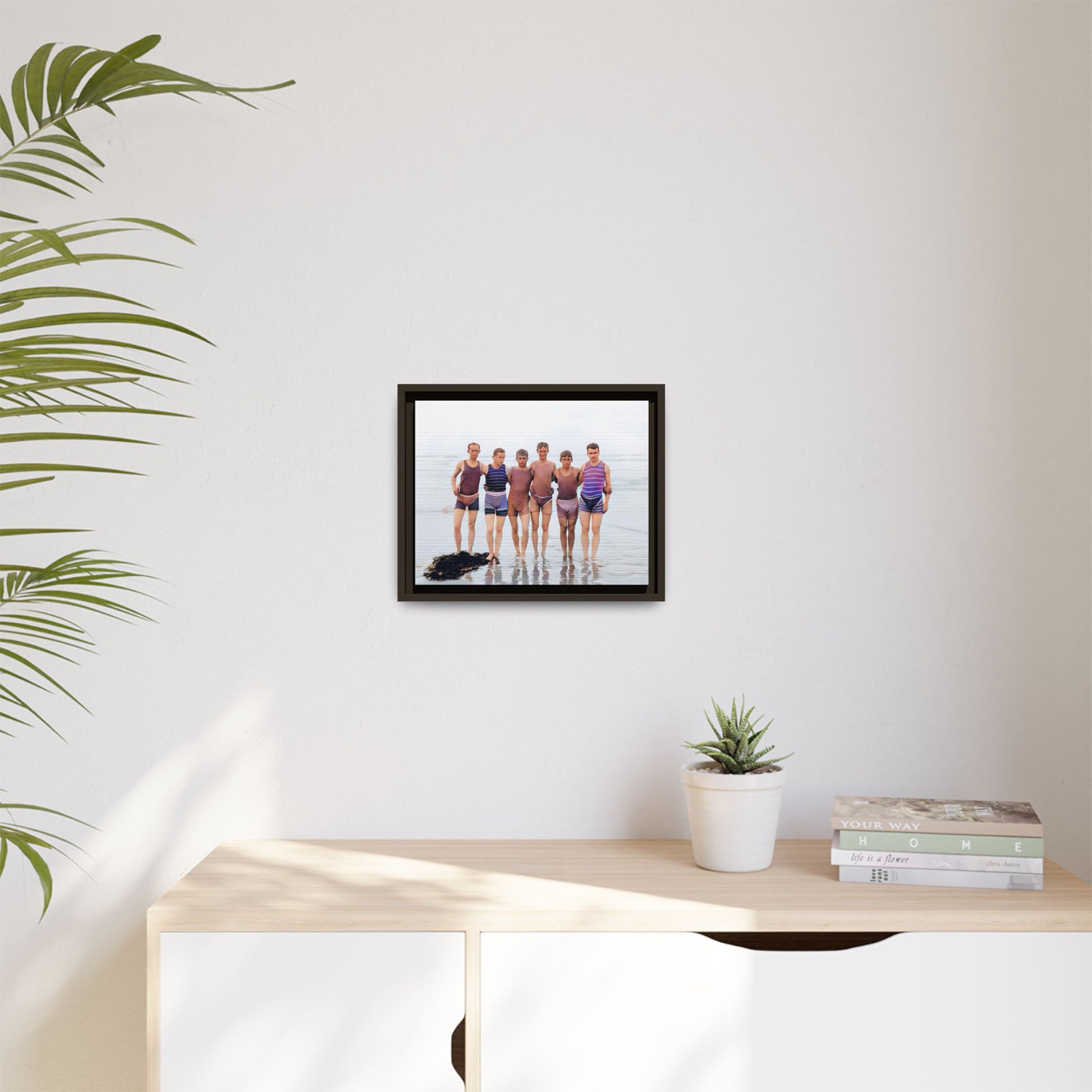 A framed vintage beach portrait on matte canvas featuring a joyful group at Herring Cove Beach, Provincetown, capturing timeless summer camaraderie.