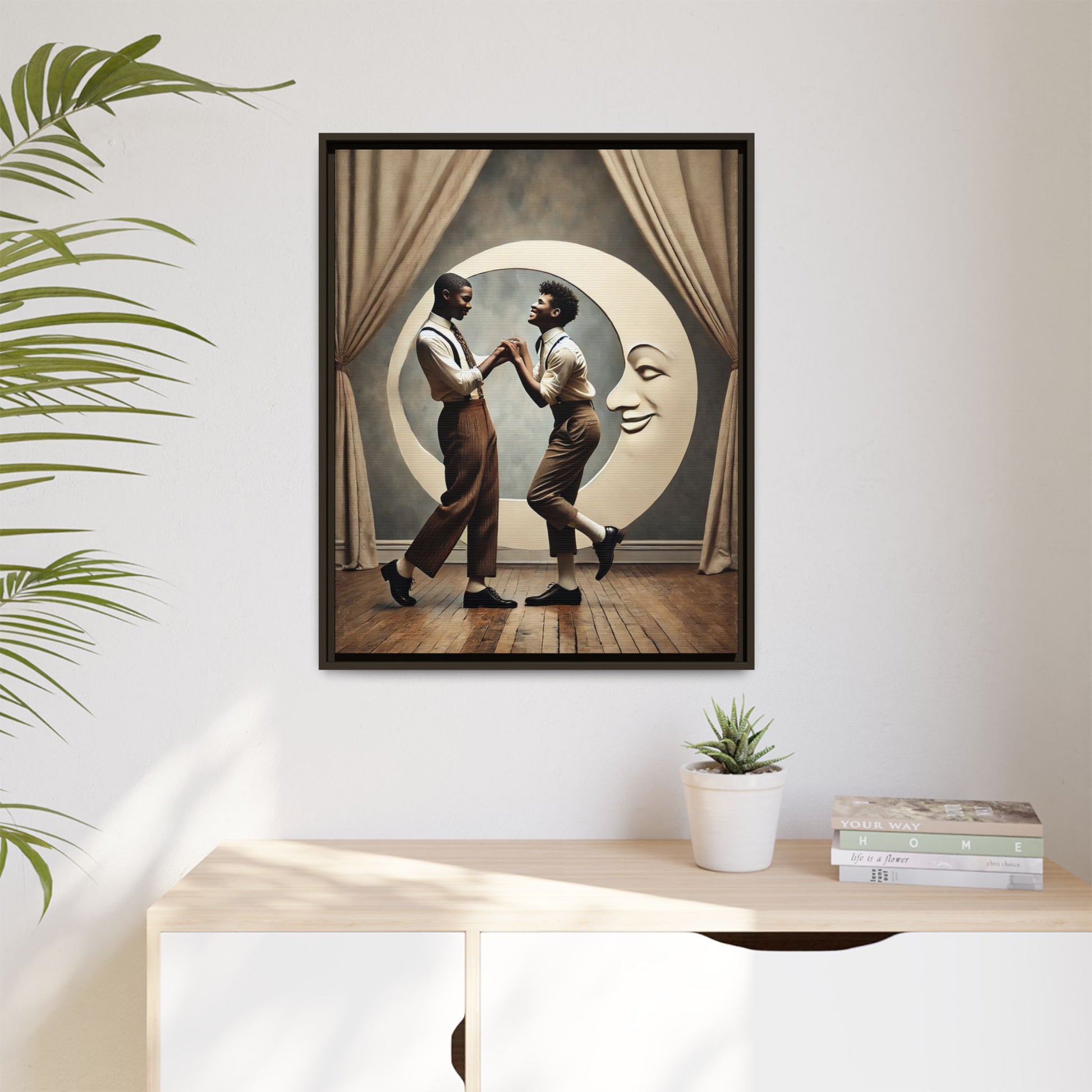 Two joyful young Black men dressed in 1920s fashion dancing in front of a crescent moon prop with a smiling face. This artwork reclaims erased queer love, offering a whimsical and powerful celebration of Black LGBTQ+ youth and history.