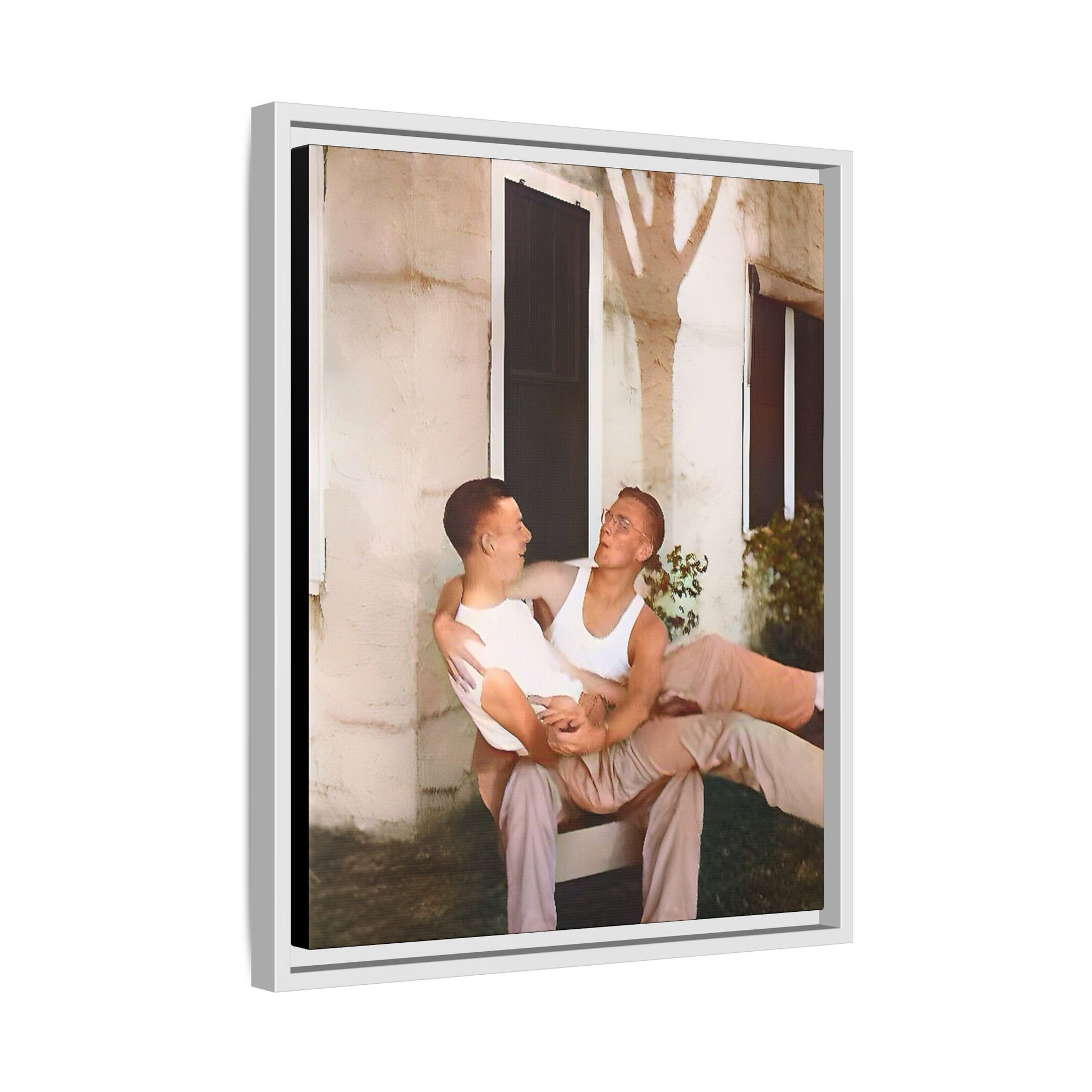 A vintage photograph of Donald and Joseph, two men embracing with joy in 1930s New Orleans. Captured in warm sunlight against a rustic Louisiana home, this intimate portrait celebrates LGBTQ+ history, love, and the beauty of unspoken connection. Gay Couple