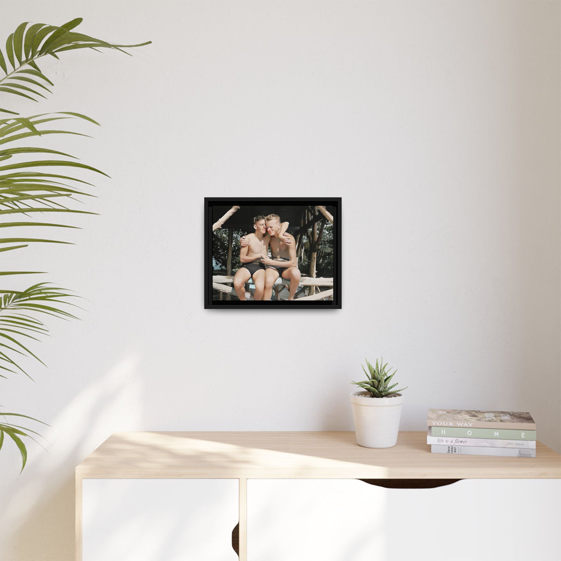 A vintage-inspired framed canvas print featuring Joseph and Billy at Kahena Beach, Hawaii. Their intimate moment under a sunlit pergola captures the warmth of love, freedom, and tropical serenity—perfect for coastal, LGBTQ+, and romantic home decor.
