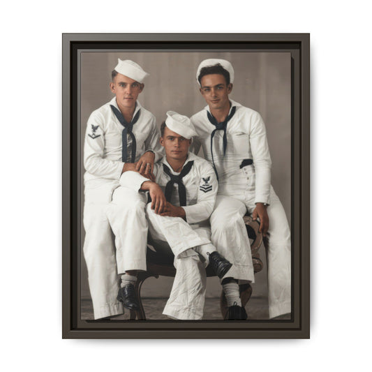 Three men wearing white caps, dark neckerchiefs, and white uniforms pose against a plain studio backdrop.