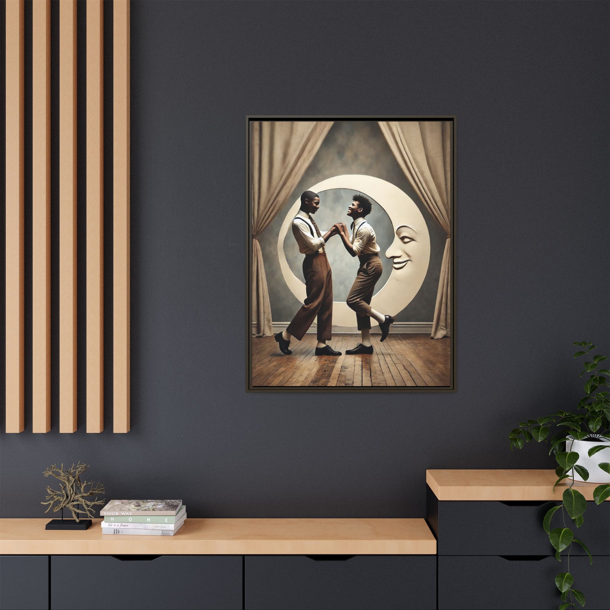 Two joyful young Black men dressed in 1920s fashion dancing in front of a crescent moon prop with a smiling face. This artwork reclaims erased queer love, offering a whimsical and powerful celebration of Black LGBTQ+ youth and history.