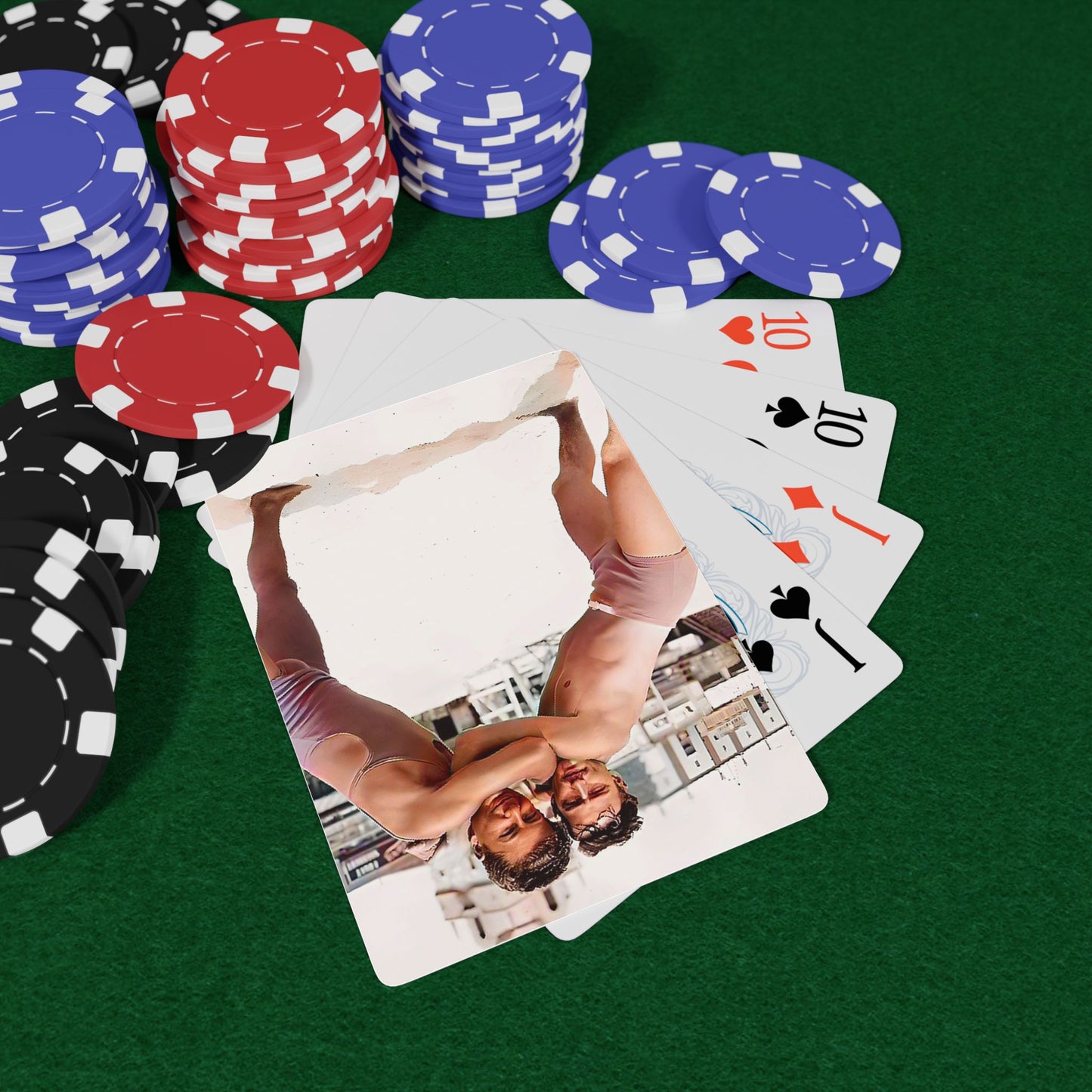Vintage poker cards featuring a restored image of two men embracing on a beach, honoring LGBTQ+ love and hidden history.