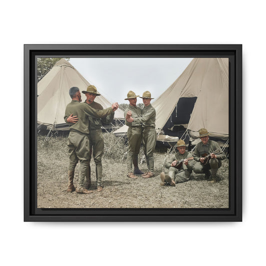 Restored colorized photograph of six uniformed men outside canvas tents, with two dancing pairs and two seated string musicians.