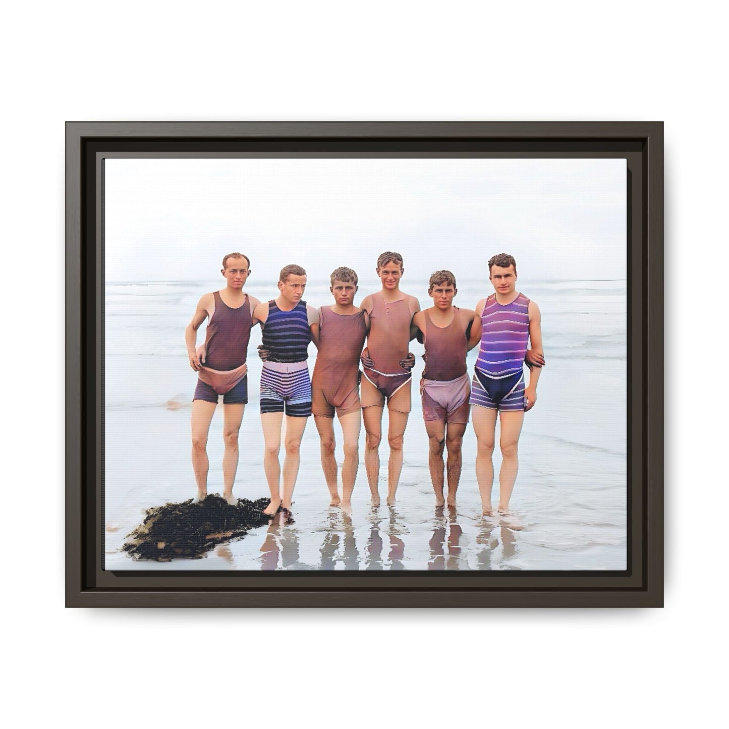 A framed vintage beach portrait on matte canvas featuring a joyful group at Herring Cove Beach, Provincetown, capturing timeless summer camaraderie.