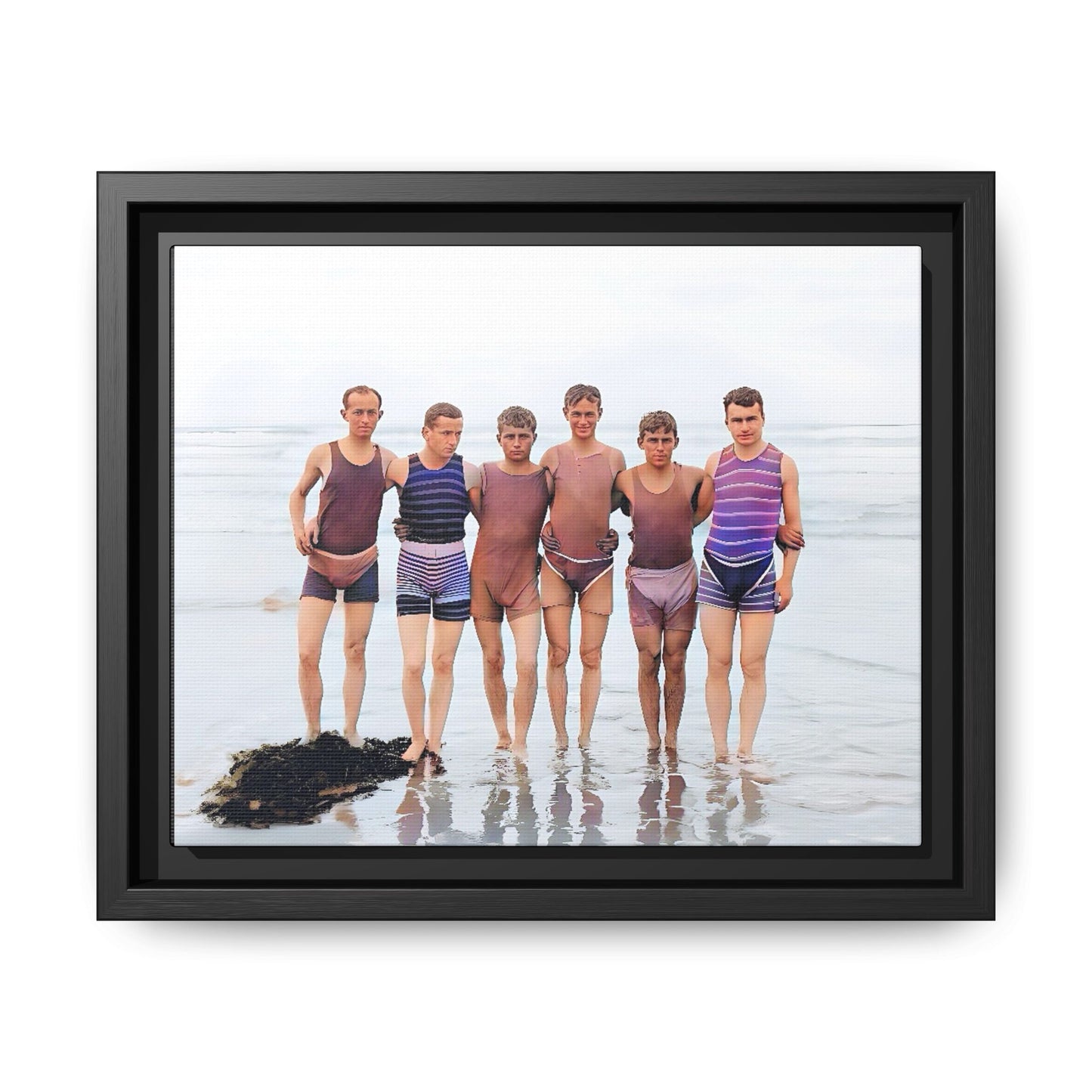A framed vintage beach portrait on matte canvas featuring a joyful group at Herring Cove Beach, Provincetown, capturing timeless summer camaraderie.