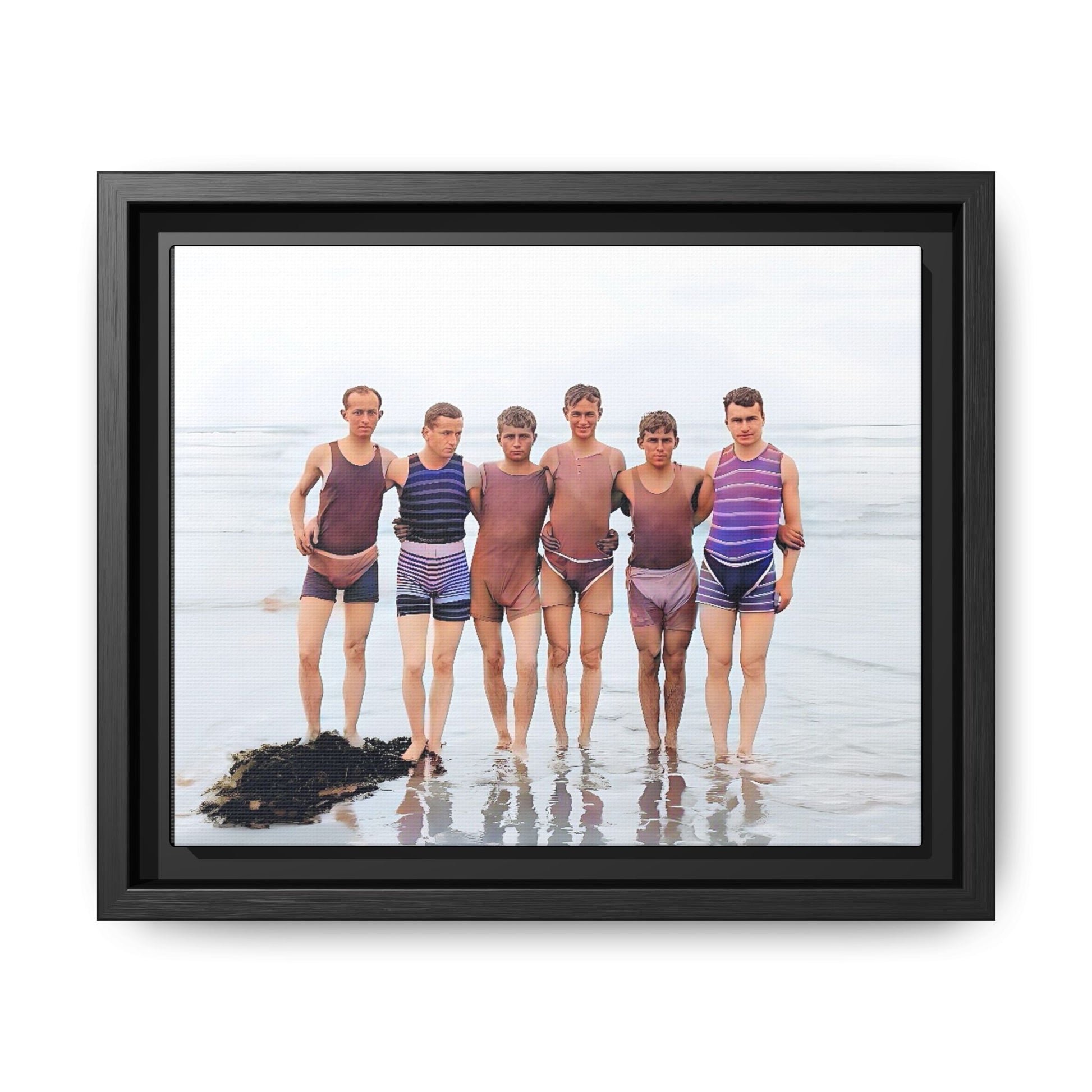 A framed vintage beach portrait on matte canvas featuring a joyful group at Herring Cove Beach, Provincetown, capturing timeless summer camaraderie.