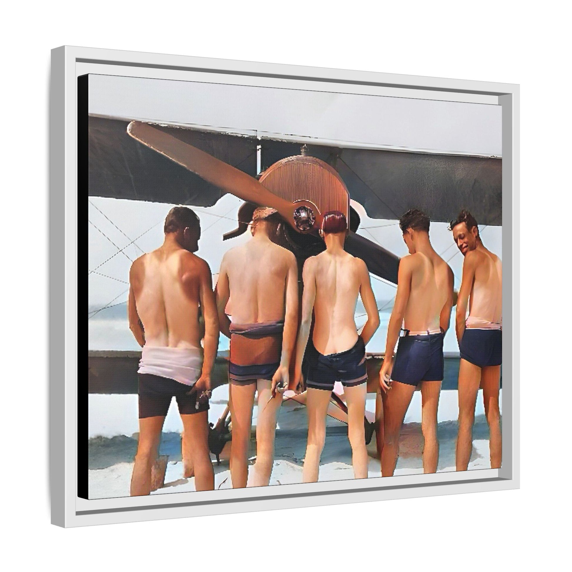 A beautifully restored vintage photograph of five men standing on a sunlit Key West beach with a vintage aircraft in the background. This nostalgic canvas print captures coastal adventure, camaraderie, and the free spirit of aviation history. Men urinating