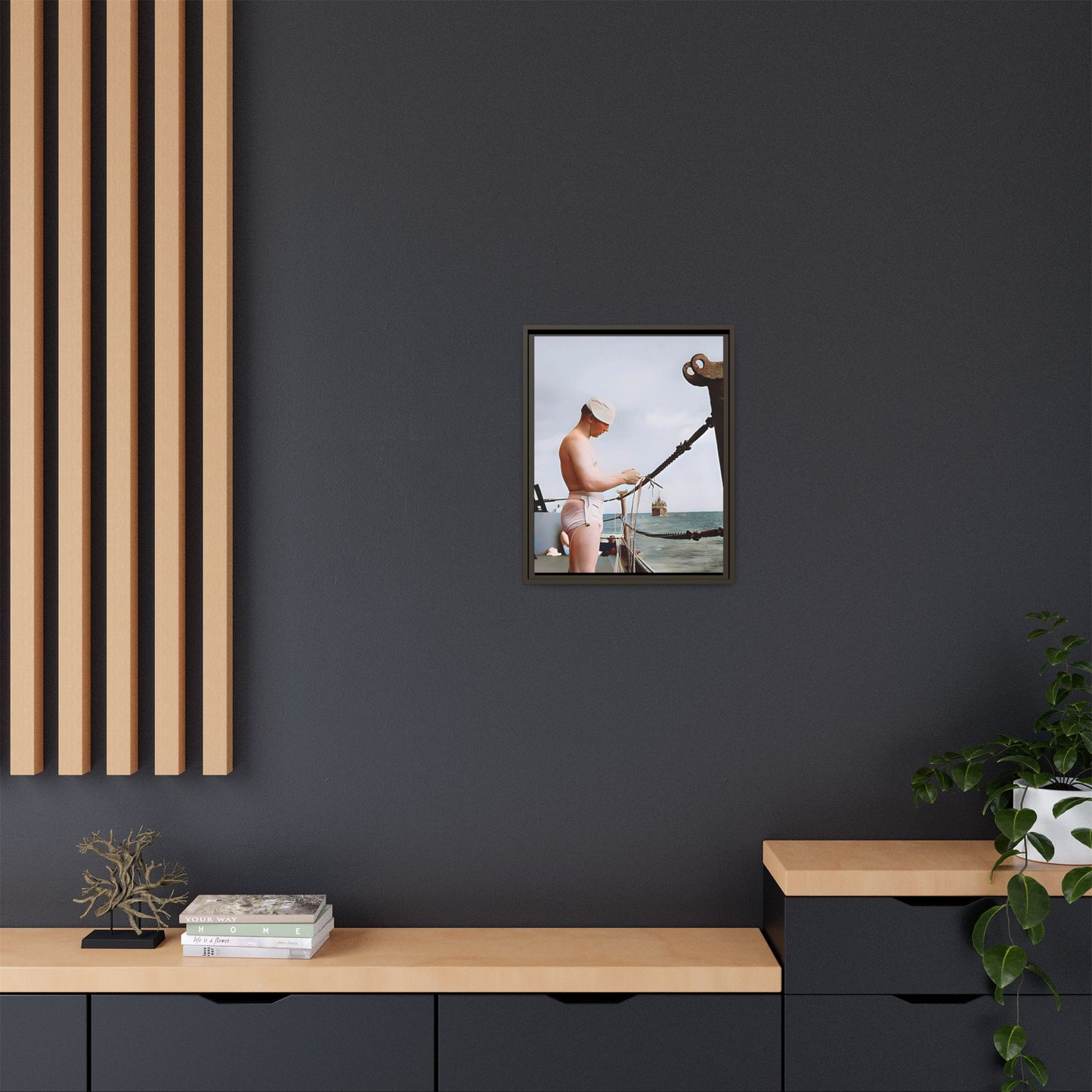A framed vintage naval portrait on matte canvas featuring a sailor aboard the USS Iowa, honoring maritime history and dedication.