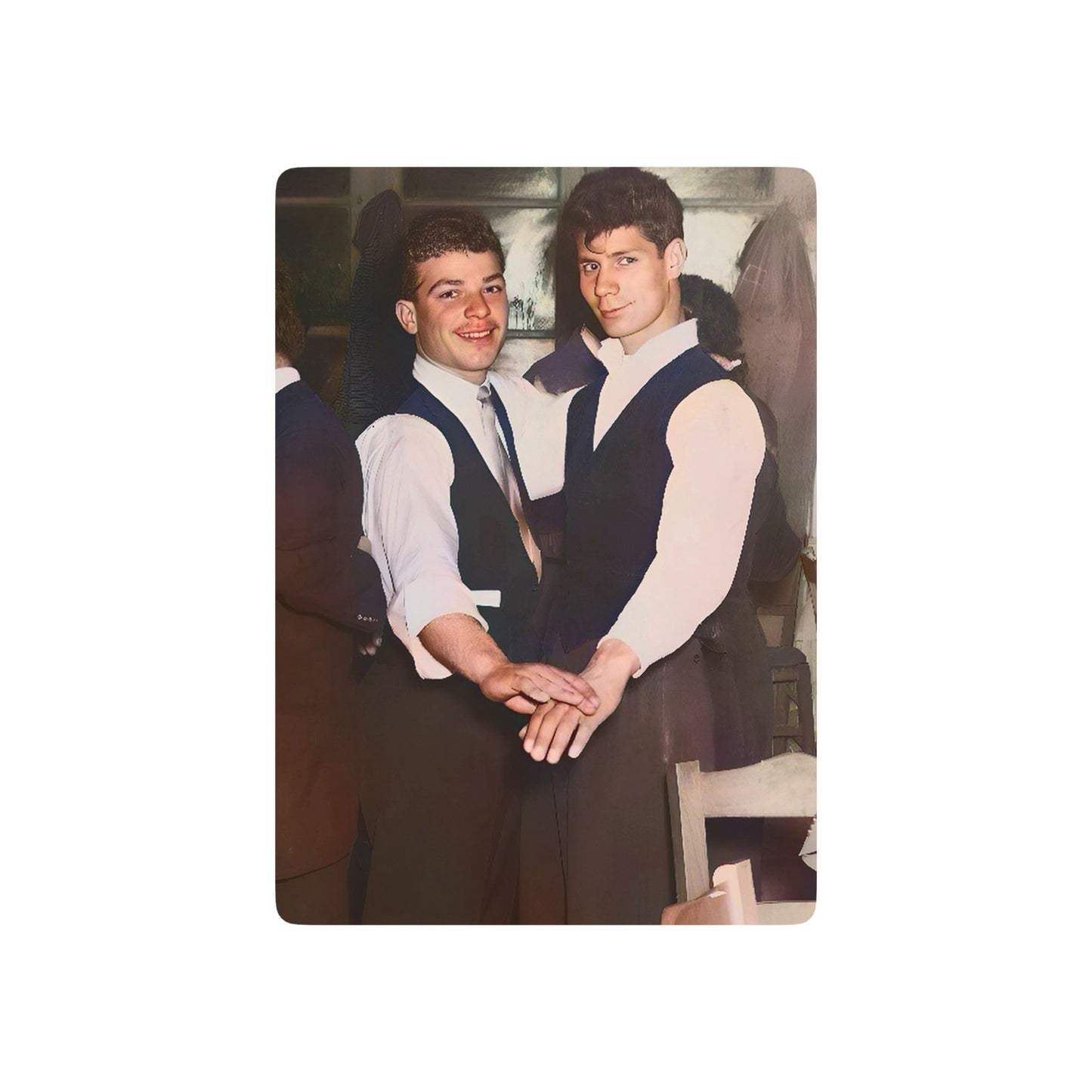 Vintage photo of a stylish gay couple in formal attire, clasping hands in a dance, symbolizing Queer love and joy.