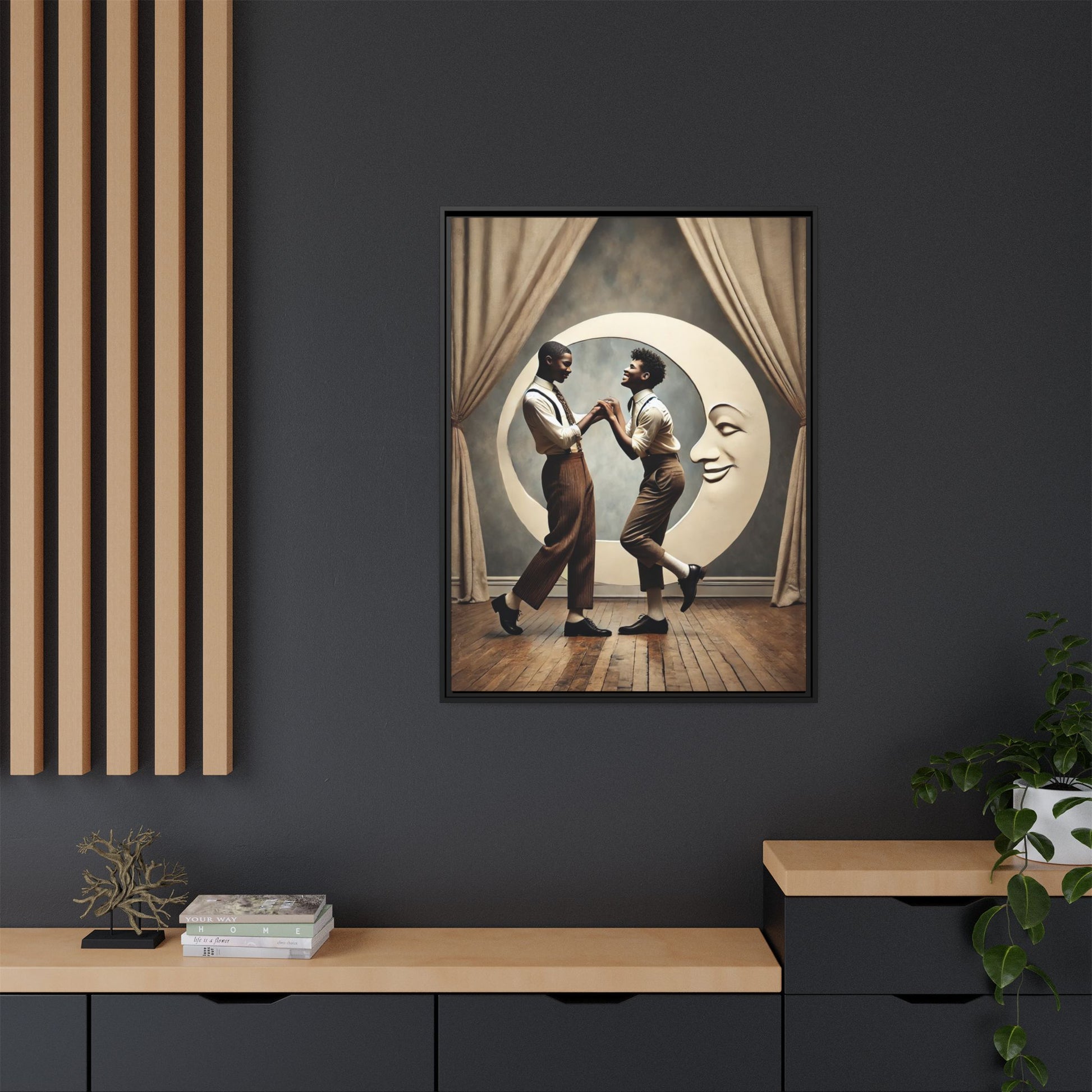 Two joyful young Black men dressed in 1920s fashion dancing in front of a crescent moon prop with a smiling face. This artwork reclaims erased queer love, offering a whimsical and powerful celebration of Black LGBTQ+ youth and history.