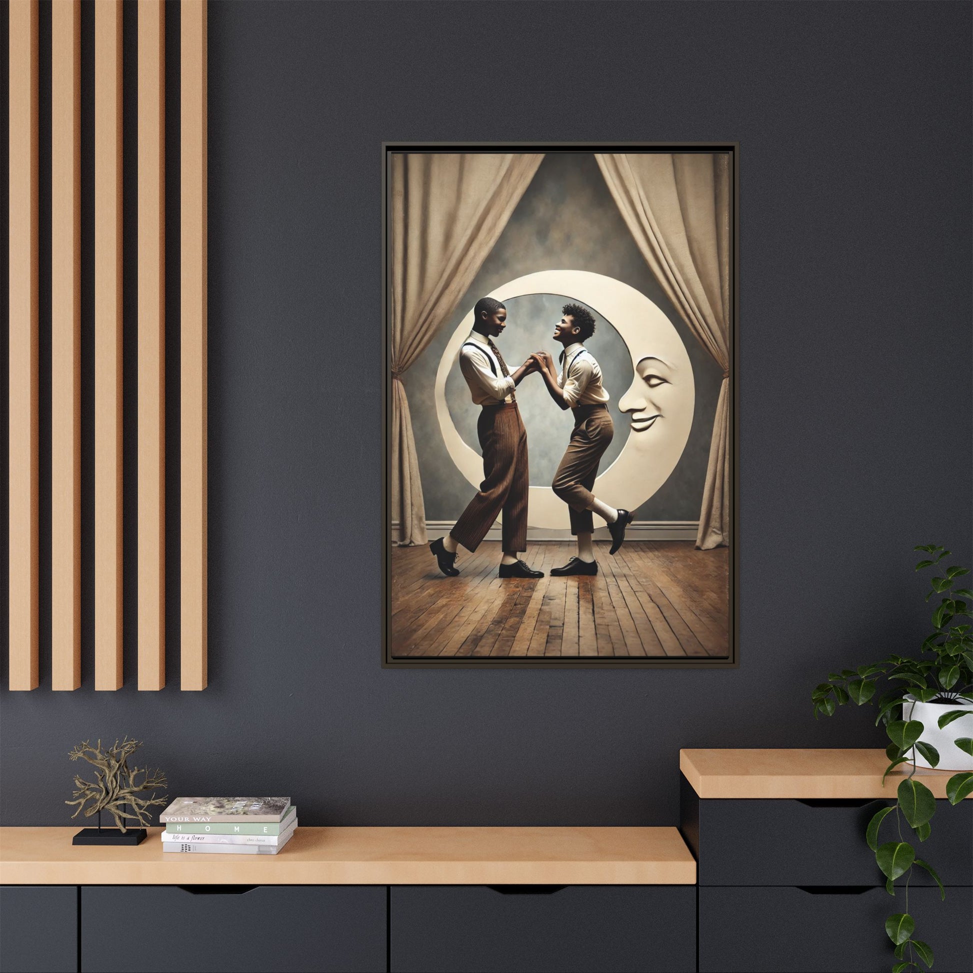 Two joyful young Black men dressed in 1920s fashion dancing in front of a crescent moon prop with a smiling face. This artwork reclaims erased queer love, offering a whimsical and powerful celebration of Black LGBTQ+ youth and history.