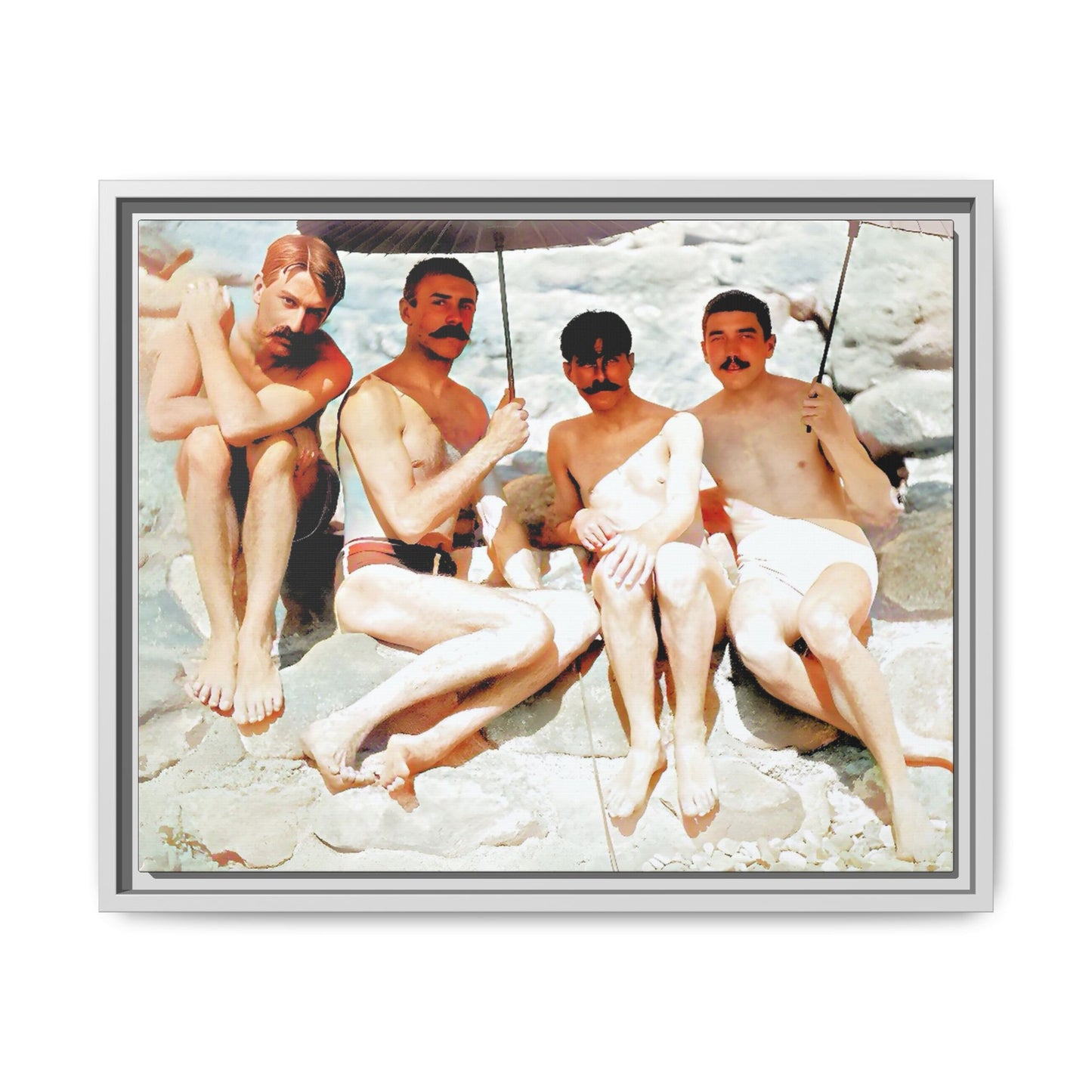A nostalgic vintage beach photograph from Herring Cove Beach, Provincetown, MA. This framed canvas print captures four men in a relaxed summer moment, perfect for coastal home decor or as an LGBTQ+ history tribute.