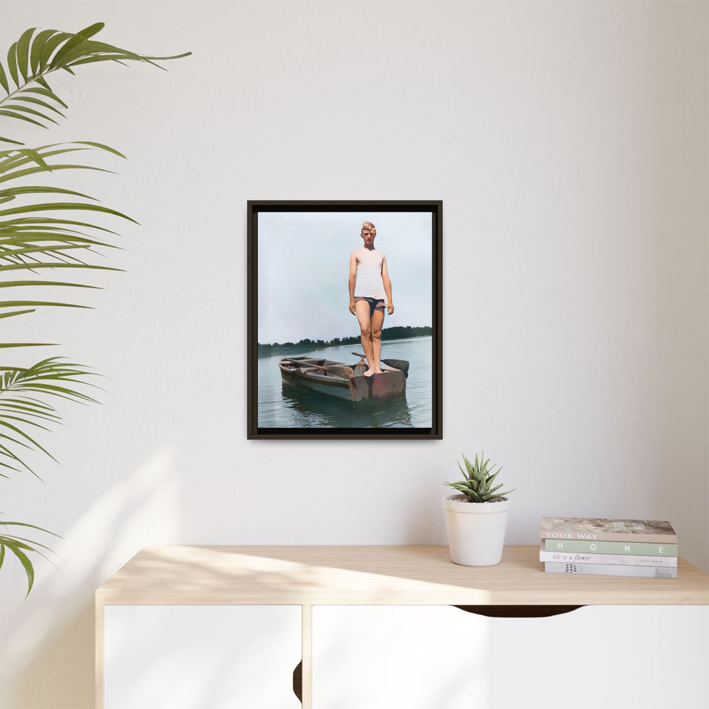 A framed vintage lake portrait on matte canvas featuring George standing on a rowboat at Creve Coeur Lake, Missouri, capturing timeless outdoor nostalgia.