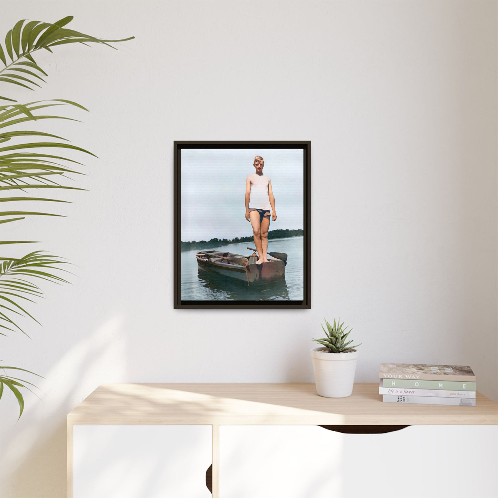 A framed vintage lake portrait on matte canvas featuring George standing on a rowboat at Creve Coeur Lake, Missouri, capturing timeless outdoor nostalgia.