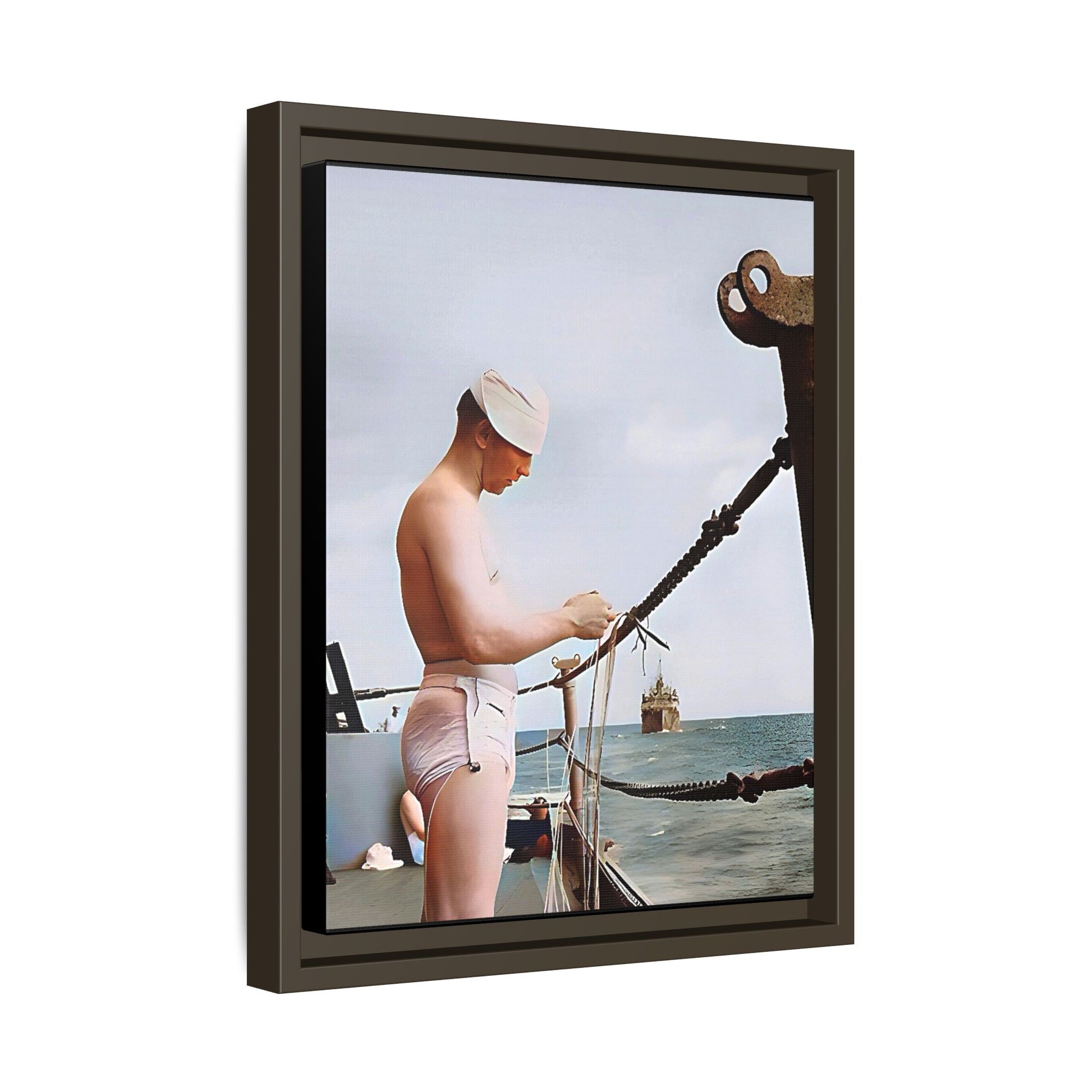 A framed vintage naval portrait on matte canvas featuring a sailor aboard the USS Iowa, honoring maritime history and dedication.