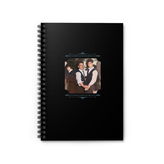 Spiral notebook featuring a restored vintage photo of two young men dancing and holding hands in formal attire