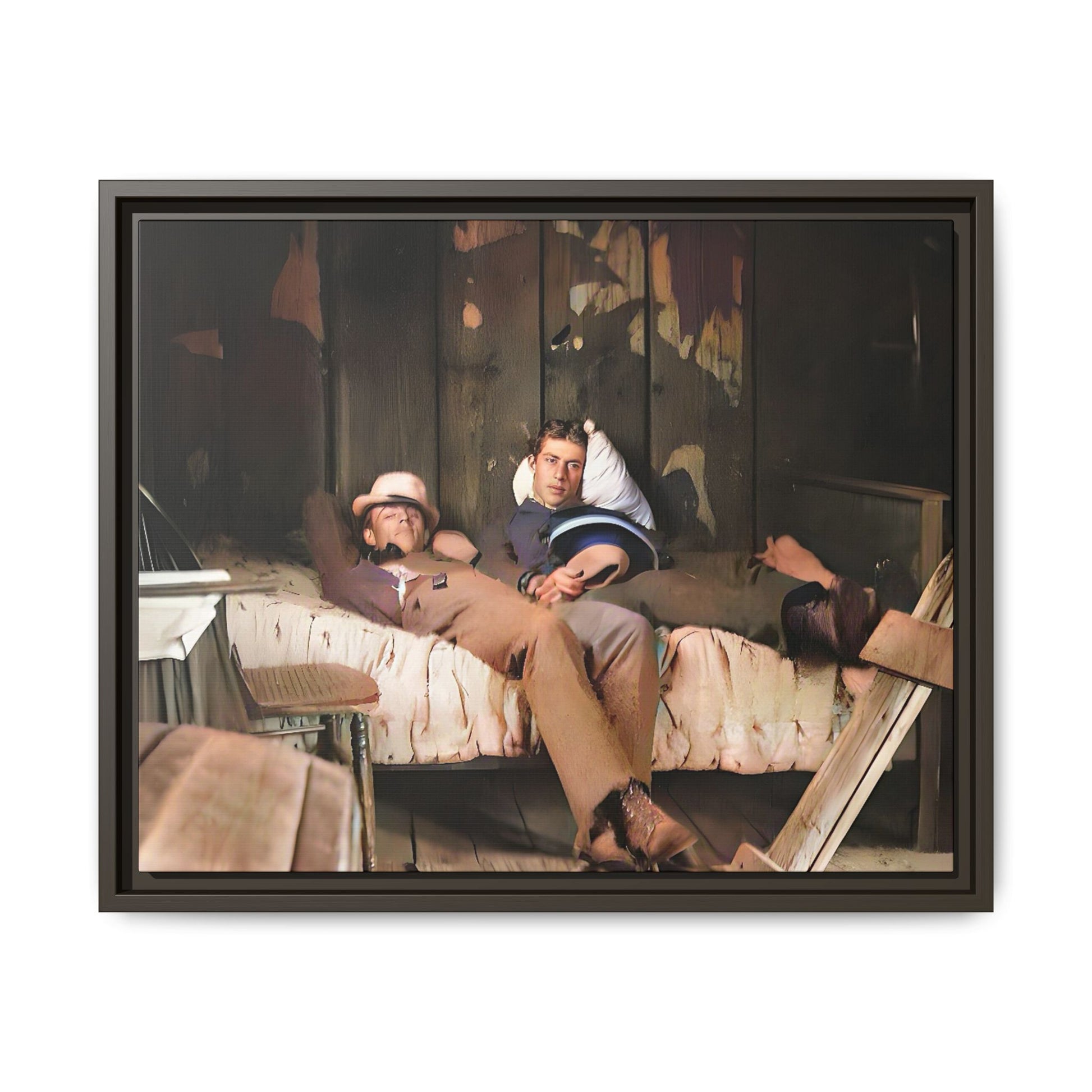 A vintage portrait of Henry & Joseph in a rustic Oregon cabin. This framed matte canvas captures LGBTQ+ history, love, and the beauty of a quiet, intimate moment, making it a timeless and meaningful addition to any collection or home. Gay Couple in bed.