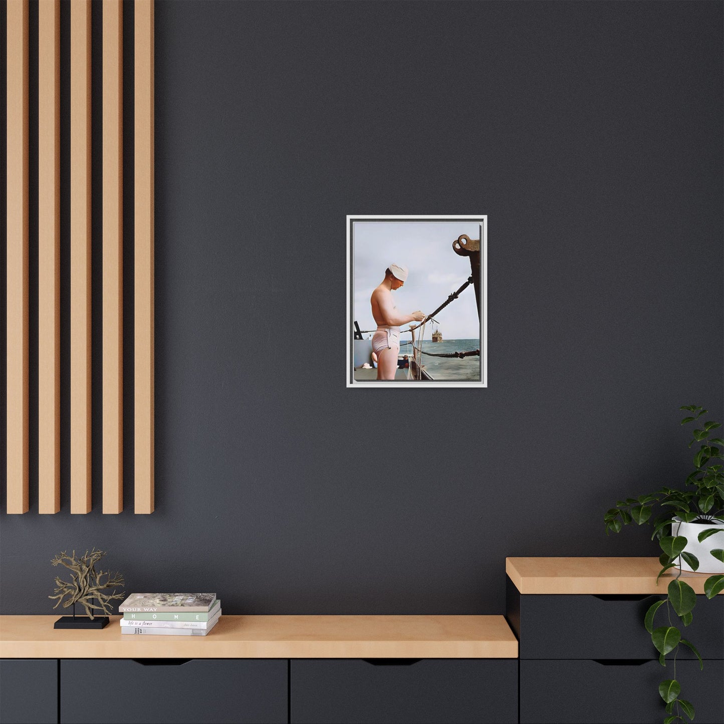 A framed vintage naval portrait on matte canvas featuring a sailor aboard the USS Iowa, honoring maritime history and dedication.
