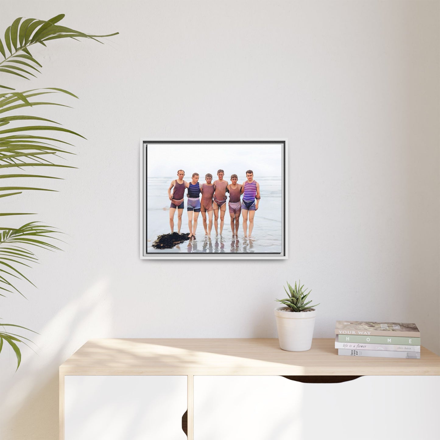 A framed vintage beach portrait on matte canvas featuring a joyful group at Herring Cove Beach, Provincetown, capturing timeless summer camaraderie.