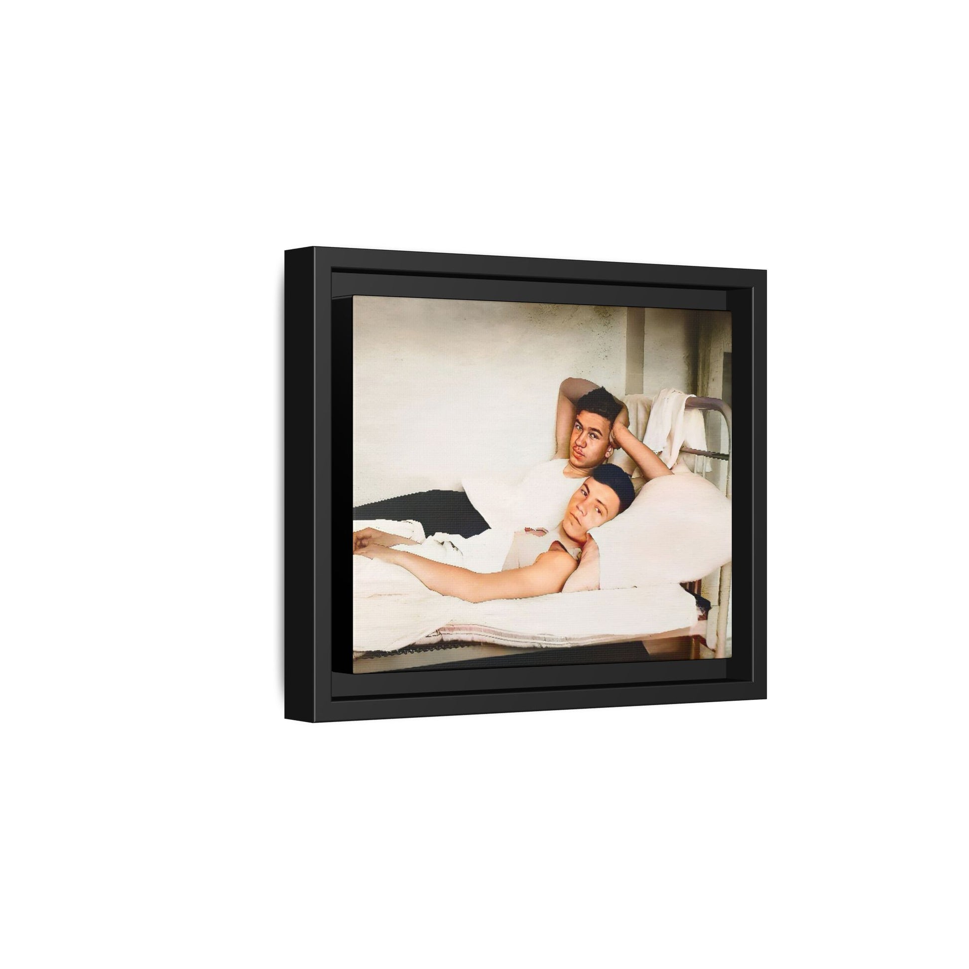 A vintage Gay couple portrait of Vernon & Jesse in Portland, Maine. This framed canvas print captures an intimate and heartfelt moment, making it a timeless addition to any home decor or a meaningful gift celebrating love and history. Men in Bed
