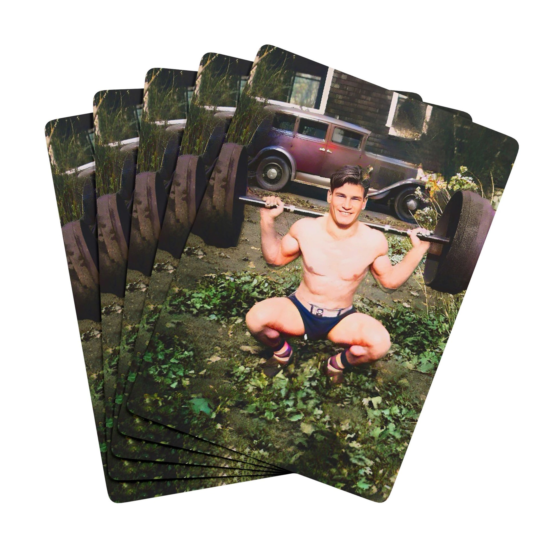 Vintage photo of a shirtless weightlifter balancing a barbell, showcasing early fitness culture and Queer resilience.