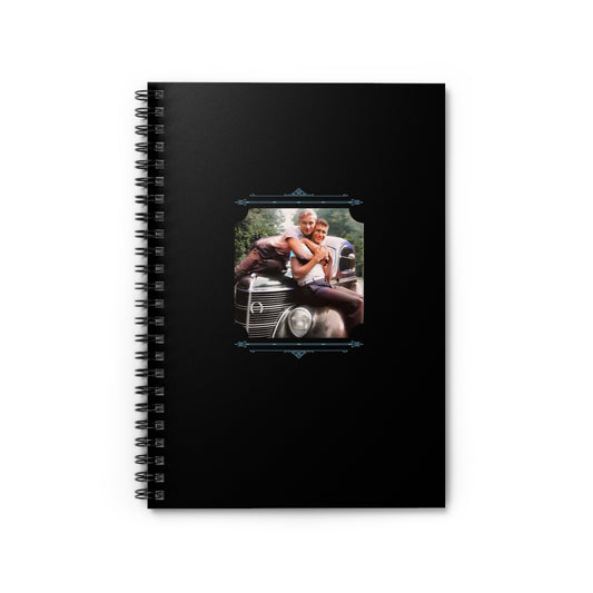 Spiral notebook featuring a vintage photo of two men affectionately sitting on a classic car hood in the 1940s.