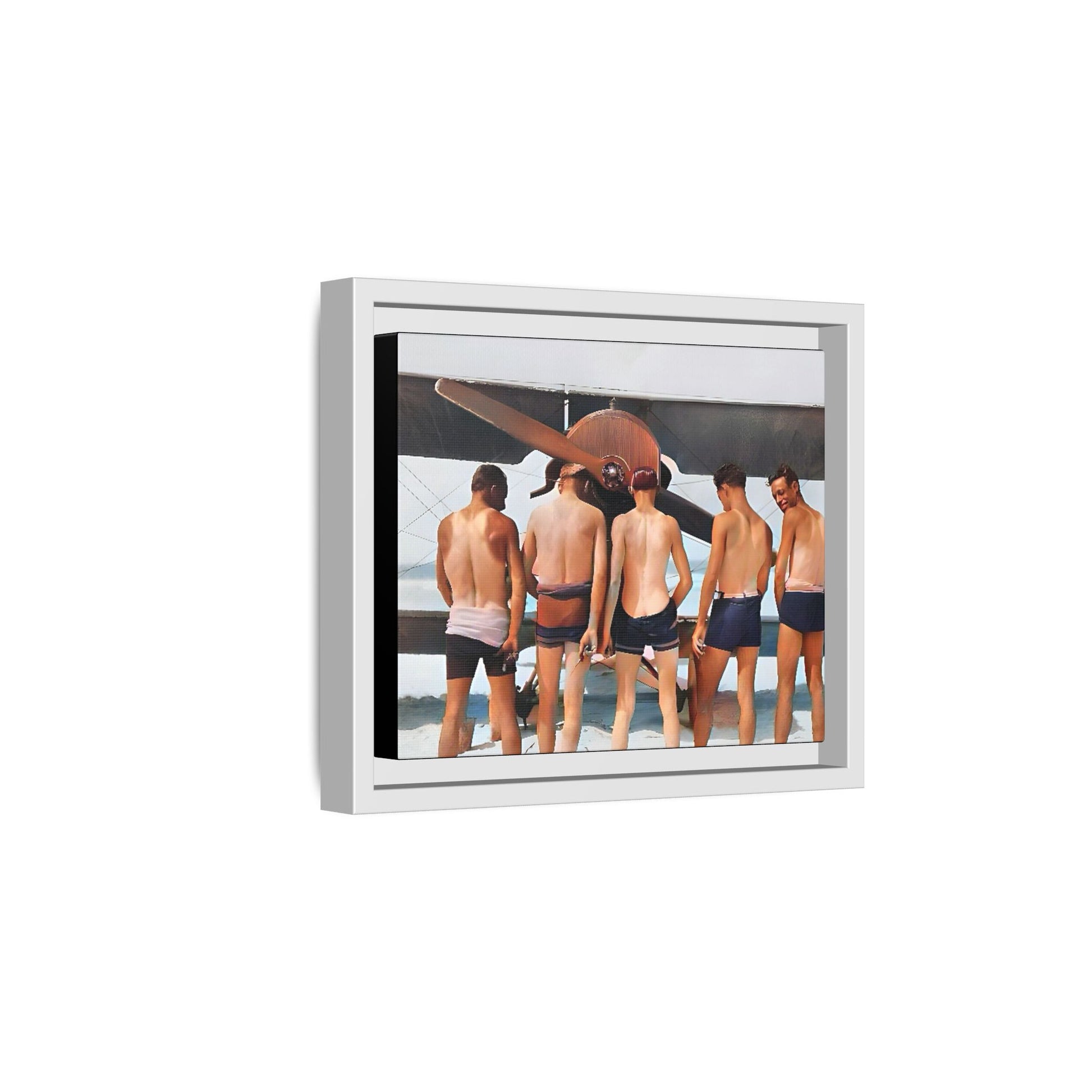 A beautifully restored vintage photograph of five men standing on a sunlit Key West beach with a vintage aircraft in the background. This nostalgic canvas print captures coastal adventure, camaraderie, and the free spirit of aviation history. Men urinating