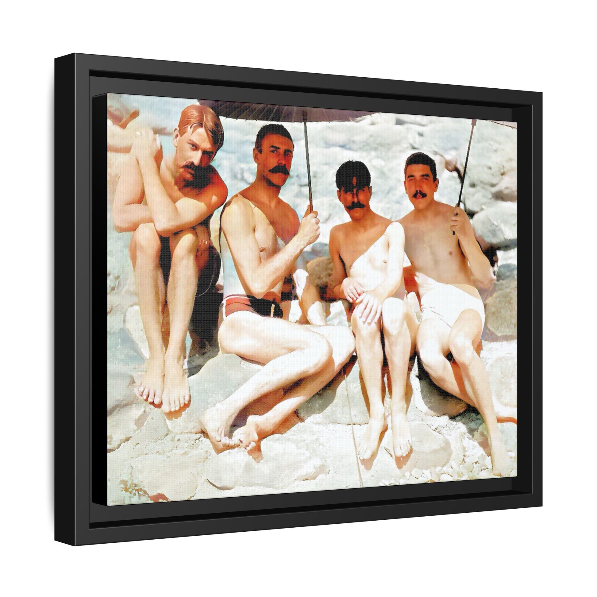 A nostalgic vintage beach photograph from Herring Cove Beach, Provincetown, MA. This framed canvas print captures four men in a relaxed summer moment, perfect for coastal home decor or as an LGBTQ+ history tribute.